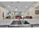 View of the kitchen sink and living room in an open concept kitchen at 5758 Nw 63Rd Pl, Ocala, FL 34482