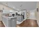 Bright kitchen with sleek white cabinets, marble countertops, and modern stainless steel appliances at 5758 Nw 63Rd Pl, Ocala, FL 34482