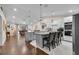Spacious open-concept kitchen featuring a center island and seamless flow into the living area at 5758 Nw 63Rd Pl, Ocala, FL 34482