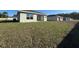 View of newly constructed single-story houses with freshly laid grass at 6584 Se 108Th Ln, Belleview, FL 34420