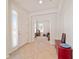 Welcoming foyer with tiled floor, neutral walls, and view to a living area at 7092 Sw 93Rd Ave, Ocala, FL 34481