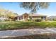 Beautiful home with a lush, green lawn and meticulous landscaping creates a welcoming and serene curb appeal at 7092 Sw 93Rd Ave # 1, Ocala, FL 34481