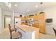 This kitchen features a breakfast bar, tile floors and white appliances at 7092 Sw 93Rd Ave # 1, Ocala, FL 34481
