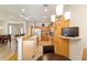This kitchen is complete with tile floors and white appliances at 7092 Sw 93Rd Ave # 1, Ocala, FL 34481