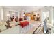 Open-concept living room and kitchen with tile floors and neutral decor at 7092 Sw 93Rd Ave # 1, Ocala, FL 34481