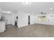 View of the open concept kitchen and dining area with modern appliances at 7280 Se County Highway 25A, Belleview, FL 34420