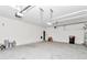 Bright, large garage with white walls and ample space at 8371 Sw 59Th Ter, Ocala, FL 34476