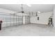 Spacious two-car garage with ample room for vehicles and storage at 8371 Sw 59Th Ter, Ocala, FL 34476