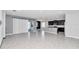 Bright living area showcasing tile flooring, smooth walls and a seamless flow into the adjacent rooms at 8371 Sw 59Th Ter, Ocala, FL 34476