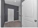 Mud room with tile flooring and ample storage space, providing convenience and organization at 8371 Sw 59Th Ter, Ocala, FL 34476