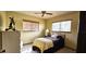 Cozy bedroom with natural light, side table, and a single bed at 8516 Sw 105Th Pl, Ocala, FL 34481
