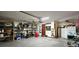 Well-organized garage with shelving, ample storage, and efficient lighting at 8516 Sw 105Th Pl, Ocala, FL 34481