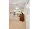 This is a bedroom with an armoire, ceiling fan, and large window at 8961 Se 130Th Loop, Summerfield, FL 34491