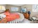 Bedroom featuring a window with natural light and a bed at 9305 Bahia Track Way, Ocala, FL 34472