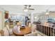 Open-concept dining area flows into kitchen and living room, creating a harmonious living space at 9305 Bahia Track Way, Ocala, FL 34472
