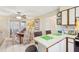 Bright dining area conveniently located between the kitchen and additional living spaces at 9305 Bahia Track Way, Ocala, FL 34472