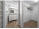 Well-lit bathroom with a double vanity and walk-in closet at 9463 Sw 93Rd Loop, Ocala, FL 34481