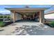 Organized garage featuring ample storage, a laundry area, and a clean, well-lit space at 9463 Sw 93Rd Loop, Ocala, FL 34481