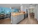 Modern kitchen with stylish gray cabinets, stainless steel appliances, and an open layout at 9463 Sw 93Rd Loop, Ocala, FL 34481