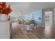 Inviting living room with modern decor, wood flooring, and an open layout at 9463 Sw 93Rd Loop, Ocala, FL 34481