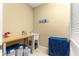 Well-equipped laundry room featuring storage options and ample space for cleaning and organization at 9841 Sw 95Th Loop, Ocala, FL 34481