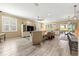 Bright living room boasts lots of natural light, ceiling fan, and an open concept design at 9841 Sw 95Th Loop, Ocala, FL 34481