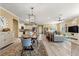 Spacious living space with kitchen, dining area, and living room in an open floor plan at 9841 Sw 95Th Loop, Ocala, FL 34481