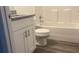 Cozy bathroom with modern cabinets, granite countertops, and a full tub and shower at Tbd Malauka Rd, Ocklawaha, FL 32179