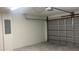Spacious two car garage with clean, white walls and an automatic garage door opener at Tbd Malauka Rd, Ocklawaha, FL 32179
