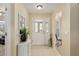Welcoming entryway showcasing neutral tones, tiled floors, and ample natural light at 10071 Sw 90Th Loop, Ocala, FL 34481