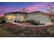 Charming single-story home with a well-manicured lawn, mature landscaping and two car garage at 10071 Sw 90Th Loop, Ocala, FL 34481