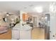 Eat-in kitchen with granite countertops overlooks the living area at 10071 Sw 90Th Loop, Ocala, FL 34481