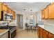 The kitchen has stainless steel appliances and granite countertops at 10071 Sw 90Th Loop, Ocala, FL 34481