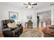 Living room featuring french doors and wood flooring at 10071 Sw 90Th Loop, Ocala, FL 34481