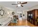 Bright living room featuring hardwood floors and an open floor plan at 10071 Sw 90Th Loop, Ocala, FL 34481