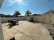 Large backyard with a beautiful view of surrounding greenery and a patio with outdoor dining set at 1118 Pelion Pl, The Villages, FL 32162