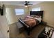 Comfortable bedroom featuring a large bed and natural lighting at 1127 Enchanted Dr, Lakeland, FL 33801