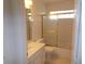 Well-maintained bathroom with vanity, tub-shower combination, and tile flooring at 11665 Sw 72Nd Cir, Ocala, FL 34476