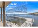 This home features a boat dock with lift, offering easy access to the water at 12336 E Highway 25, Ocklawaha, FL 32179