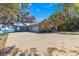 Single Gathering home featuring a 2 car garage, and water views at 12336 E Highway 25, Ocklawaha, FL 32179