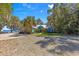 Charming waterfront home with a lush lawn and mature landscaping at 12336 E Highway 25, Ocklawaha, FL 32179