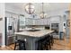 Gourmet kitchen with large island, stainless steel appliances, and ample counter space at 12336 E Highway 25, Ocklawaha, FL 32179