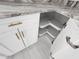 Lazy Susan shelves in corner kitchen cabinet are white at 12876 Se 42Nd Ct, Belleview, FL 34420