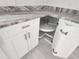 Kitchen cabinet with open lazy susan at 12876 Se 42Nd Ct, Belleview, FL 34420