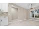 Dining room with decorative lighting and a large window providing view of the backyard at 13751 Sw 49Th Pl, Ocala, FL 34481