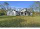 Charming single-Gathering home with board and batten siding, gabled roof, and inviting front porch at 13751 Sw 49Th Pl, Ocala, FL 34481