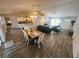 Bright, airy living space with modern furnishings and a dining area at 15055 Se 93Rd Ct, Summerfield, FL 34491