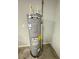 An AC Smith water heater is placed near a light gray wall near a grounded outlet at 15055 Se 93Rd Ct, Summerfield, FL 34491
