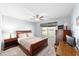 Bedroom featuring ceiling fan, carpet, and natural light at 2013 Cardona Way, The Villages, FL 32159