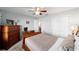 Bedroom featuring ceiling fan, carpet, and large double closet at 2013 Cardona Way, The Villages, FL 32159
